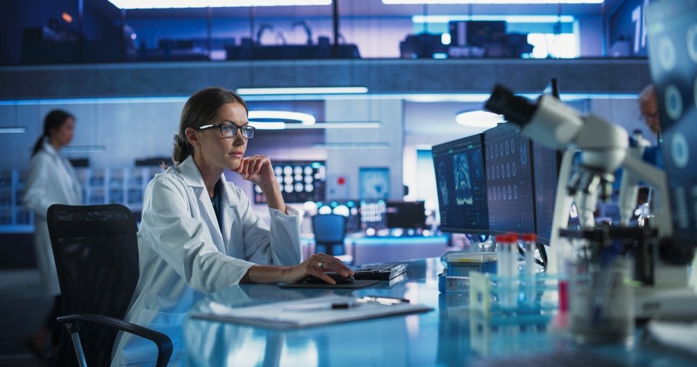 Medical,Hospital,Research,Laboratory:,Caucasian,Female,Neurosurgeon,Using,Computer,With